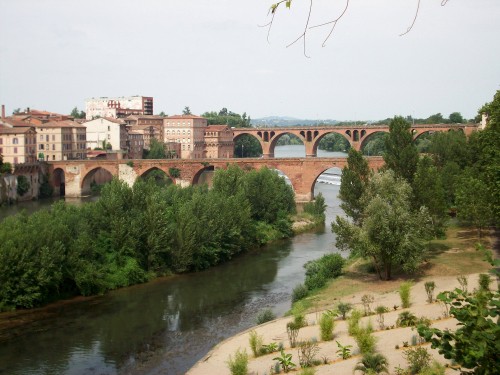 Image brown concrete bridge over river