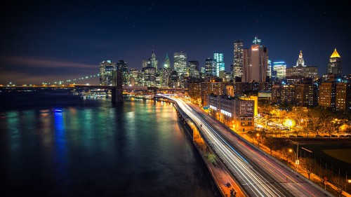 Image time lapse photography of city lights during night time