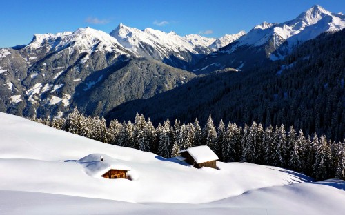 Image snow covered mountain during daytime