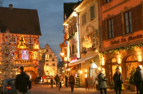 Image people walking on street during night time