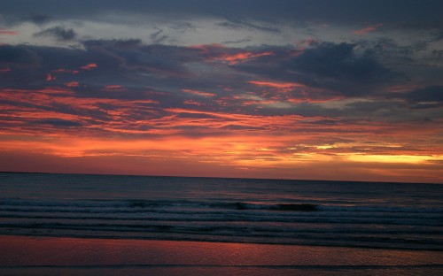 Image body of water during sunset