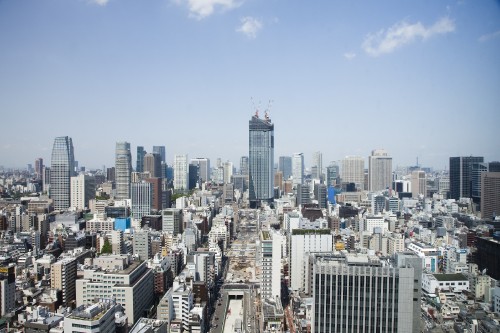 Image city skyline under blue sky during daytime