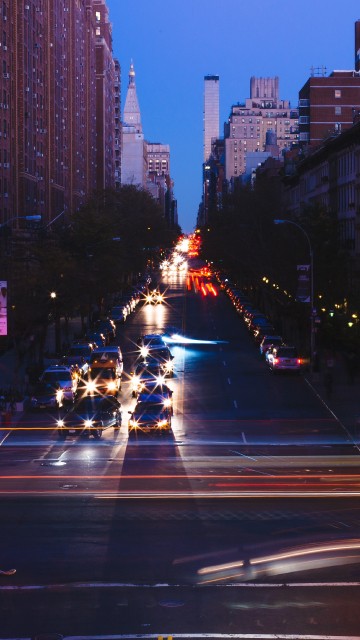 Image cars on road in city during night time