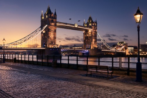 Image bridge over water during night time