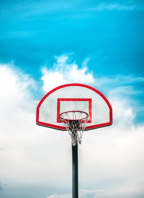 Image basketball hoop under blue sky