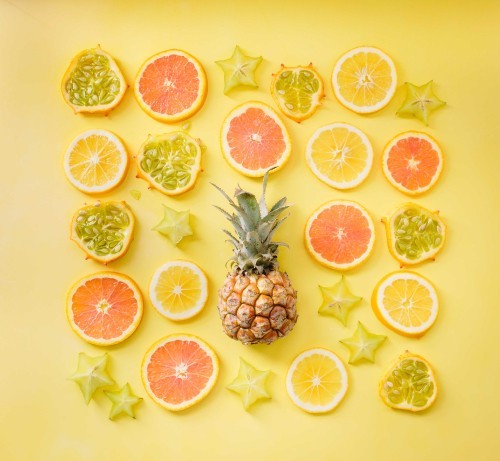 Image sliced orange fruits and pineapple fruits