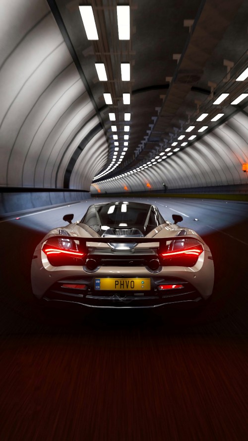 Image red porsche 911 parked in tunnel