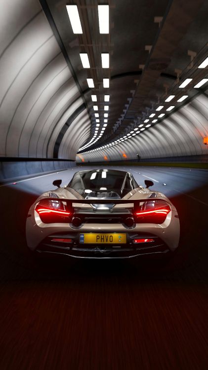 red porsche 911 parked in tunnel