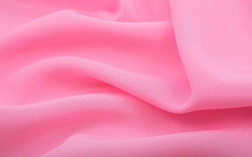 Image pink textile in close up photography