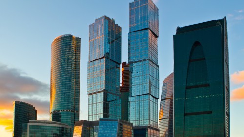 Image blue and brown high rise building