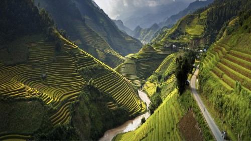 Image green mountains and river during daytime