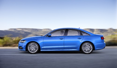 Image blue sedan on gray asphalt road