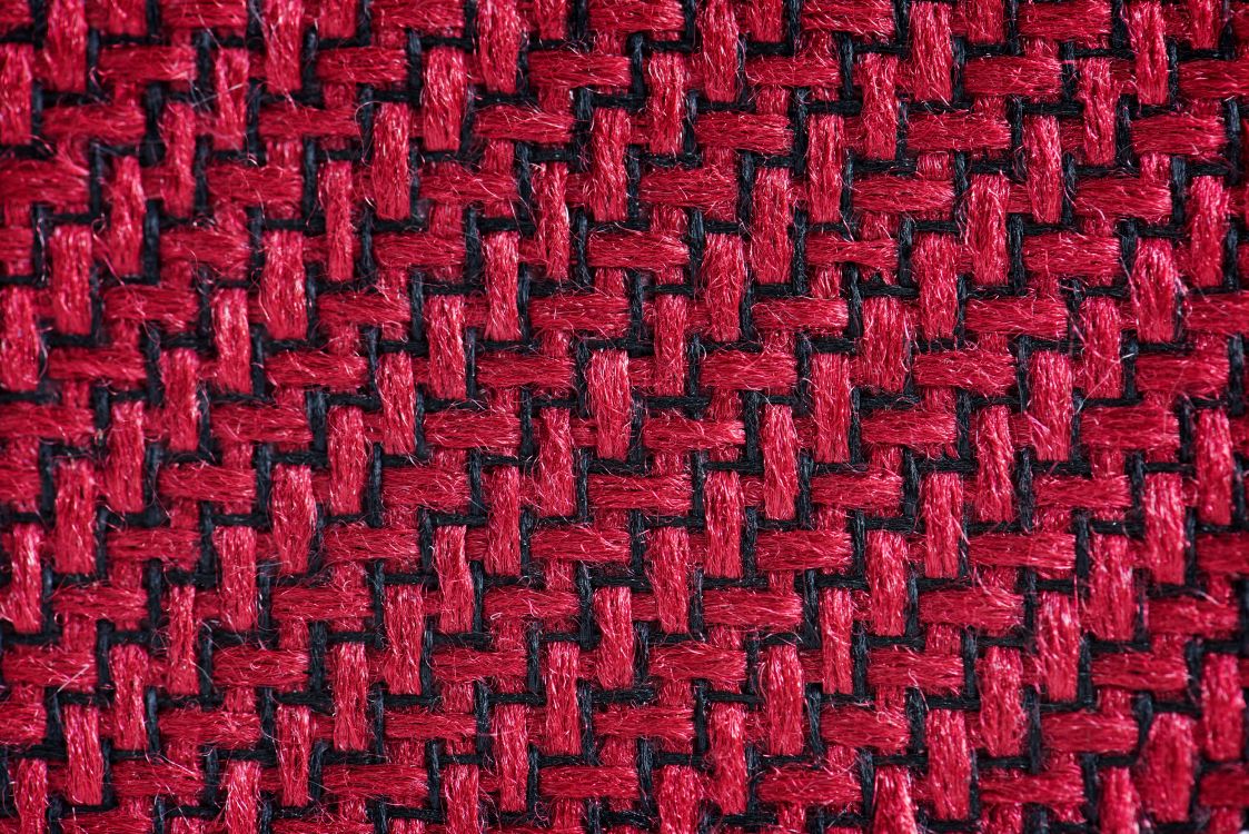 red and black knit textile