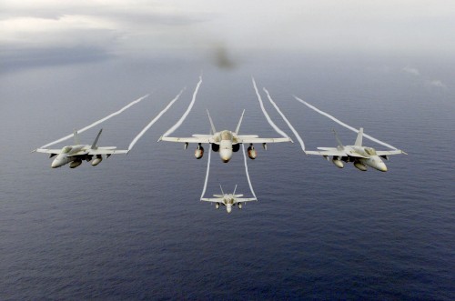 Image white jet plane on mid air during daytime