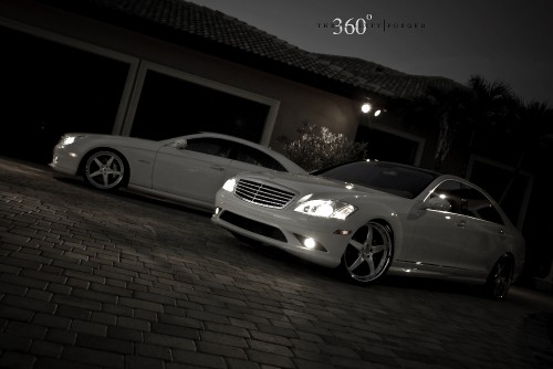 Image white mercedes benz coupe parked near brown brick wall