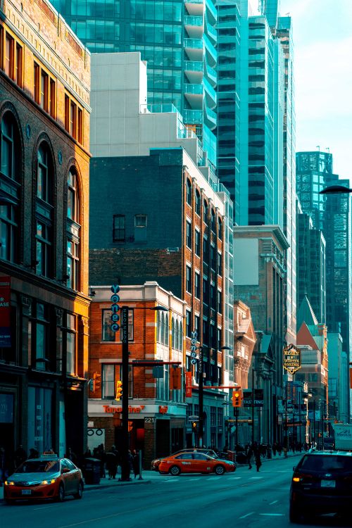 brown and white concrete buildings during daytime