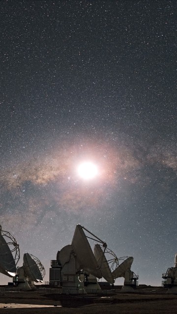 Image white and brown houses under starry night