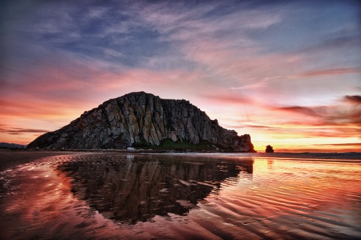 Wallpaper Brown and Gray Rock Formation on Body of Water During Sunset ...