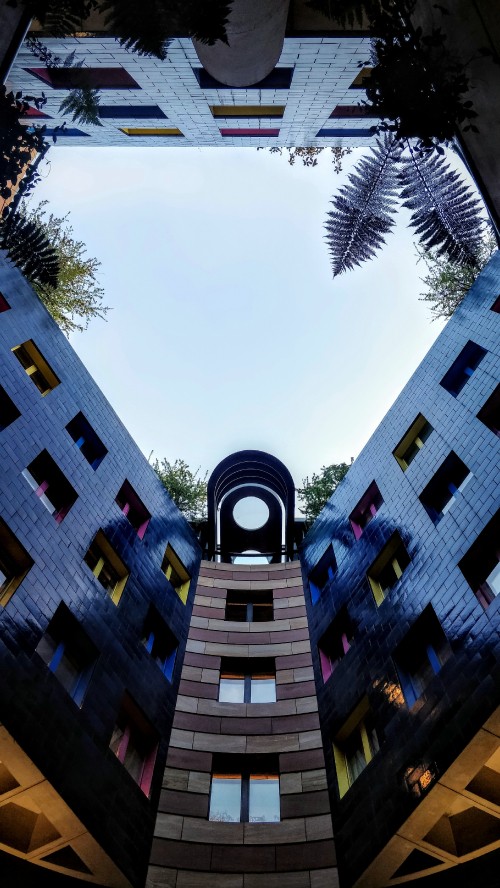 Image blue and white concrete building