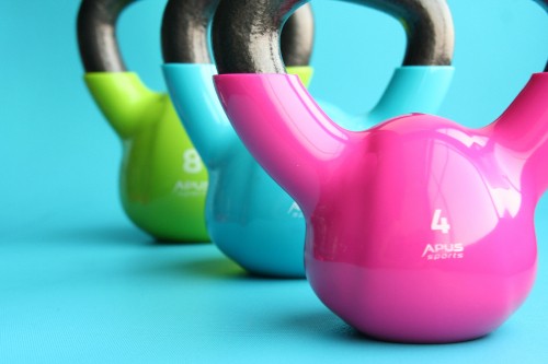 Image purple green and yellow kettle bell