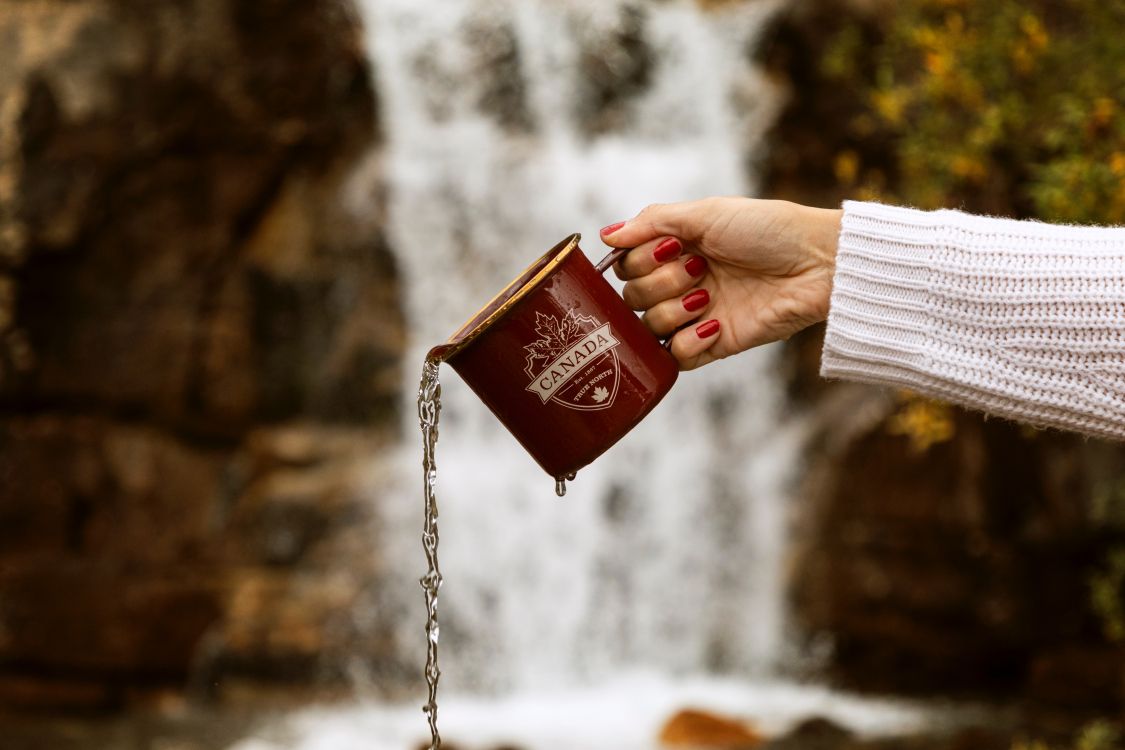 Person Holding Red and White Book. Wallpaper in 6720x4480 Resolution