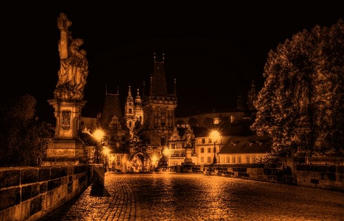 Image lighted building near body of water during night time