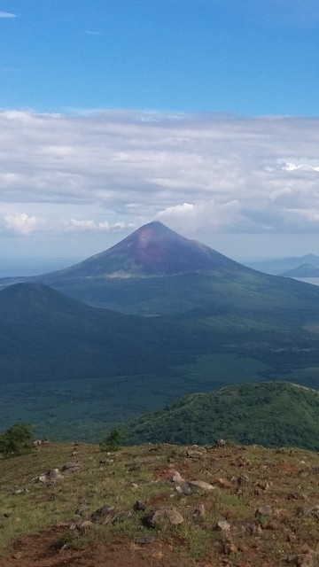 Image green mountain under blue sky during daytime