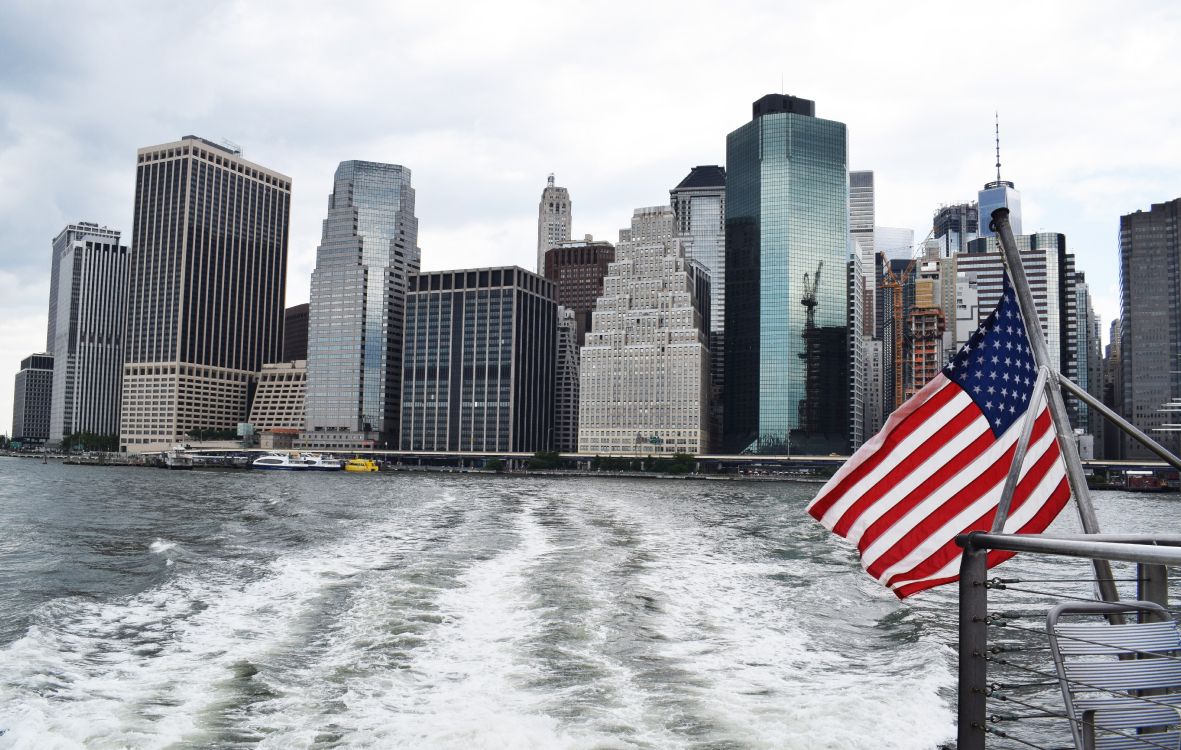 city skyline across body of water during daytime