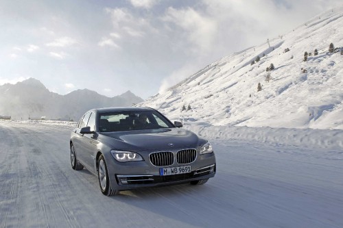 Image black bmw car on road during daytime