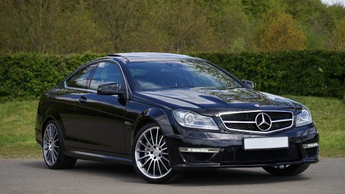 Image black mercedes benz coupe on road during daytime