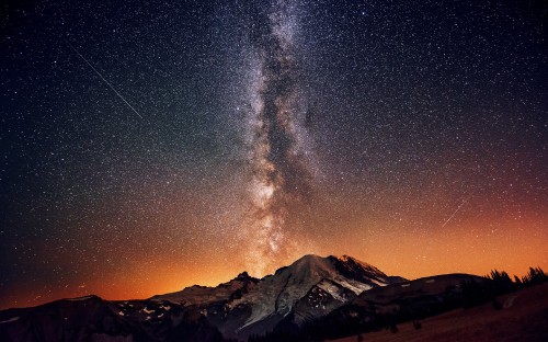 Image snow covered mountain under starry night