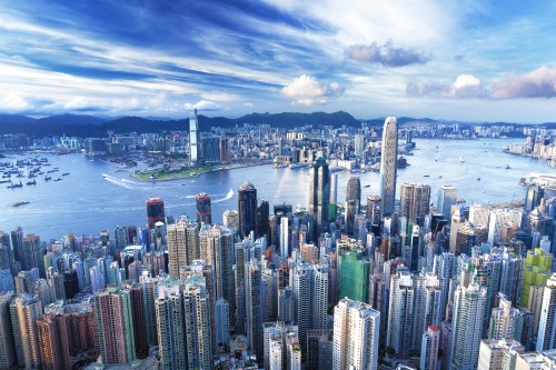 Image city skyline under blue sky during daytime