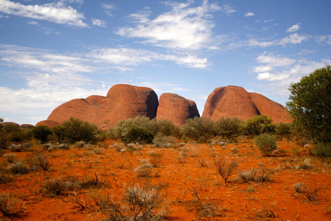 brown rock formation under blue sky during daytime