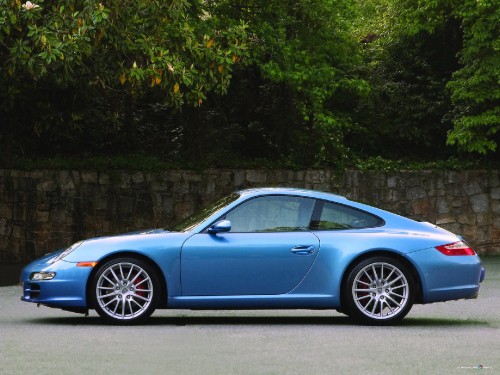 Image blue car parked near green trees during daytime