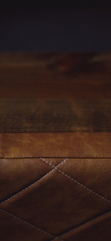 Image brown leather textile on brown wooden table