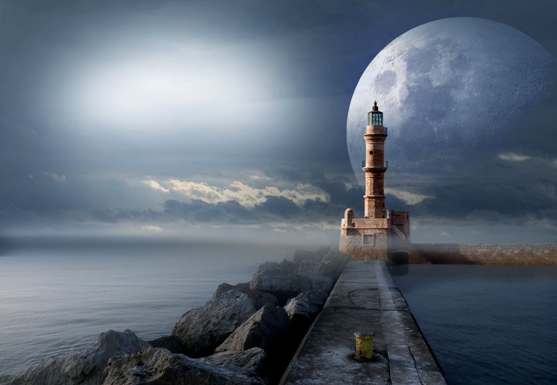 Brauner Betonleuchtturm in Der Nähe Von Gewässern Während Der Nacht. Wallpaper in 3300x2282 Resolution