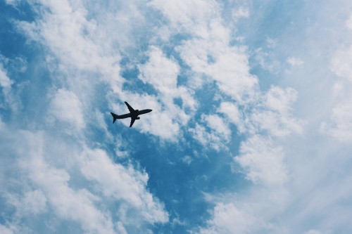 Image airplane flying in the sky during daytime