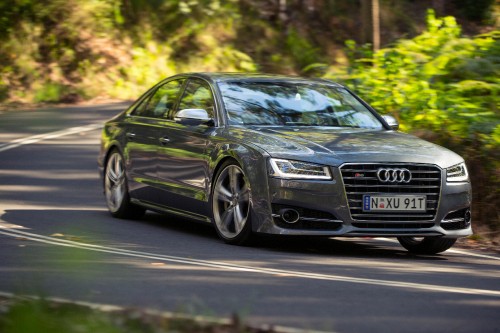 Image black audi sedan on road during daytime