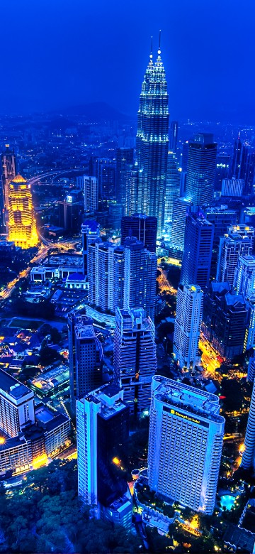 Image aerial view of city buildings during night time
