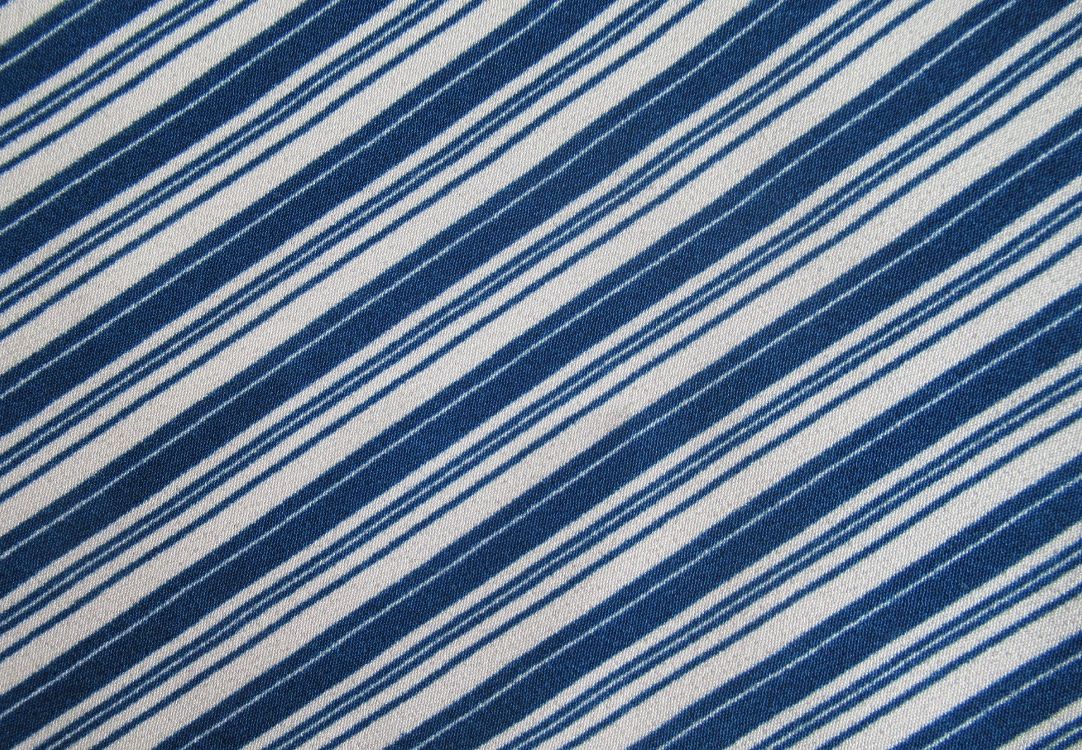 blue and white striped textile