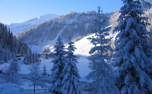 Image snow covered mountain during daytime