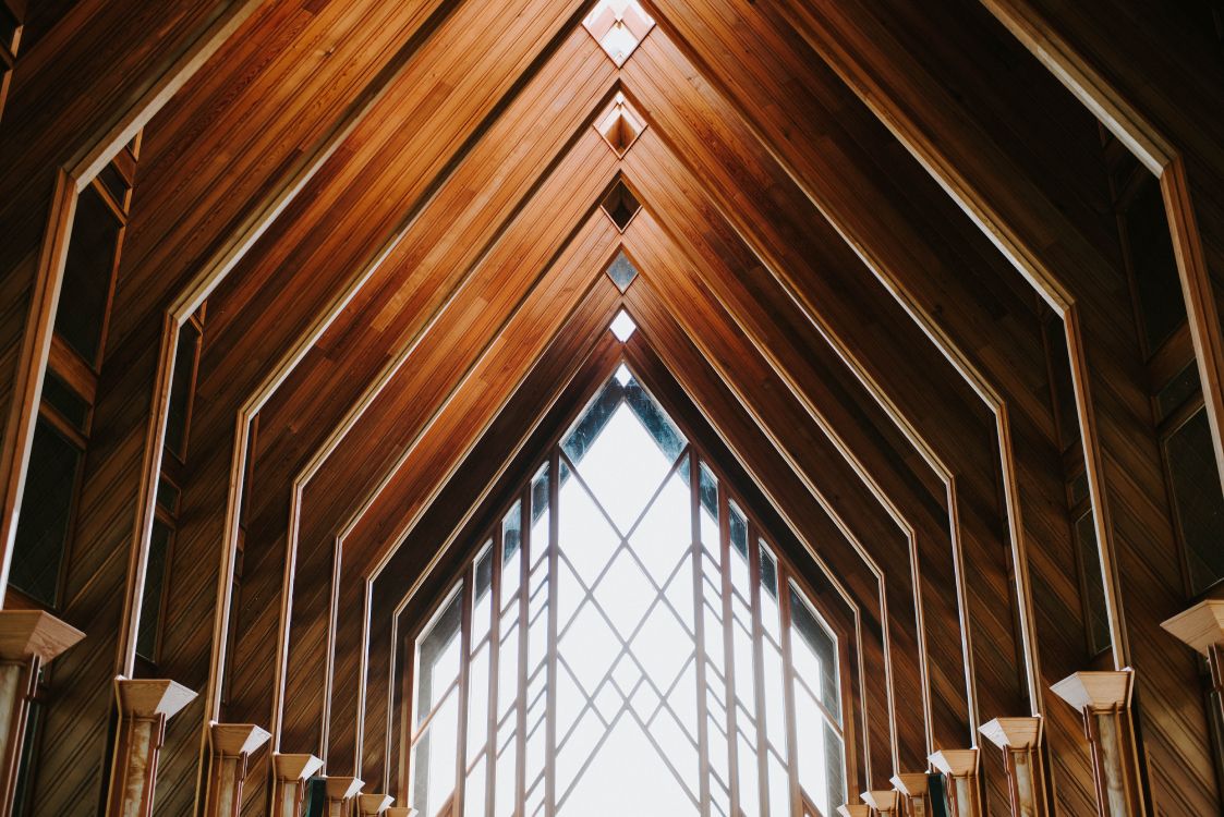 brown wooden ceiling with glass windows