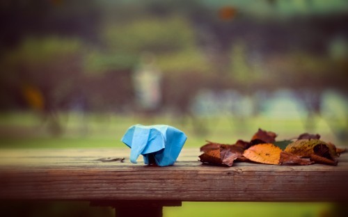 Image blue textile on brown wooden bench