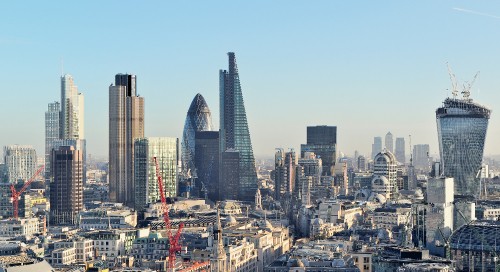 Image city skyline under blue sky during daytime