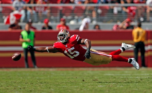 Image football player in red jersey shirt and helmet