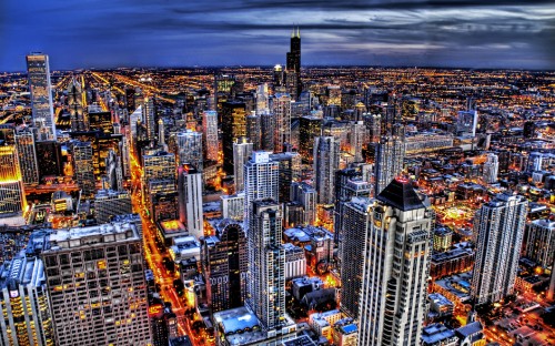 Image aerial view of city buildings during night time