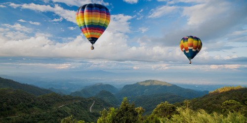 Image hot air balloon in mid air during daytime