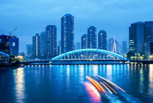 Image time lapse photography of city skyline during night time