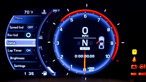 Image black and orange analog speedometer