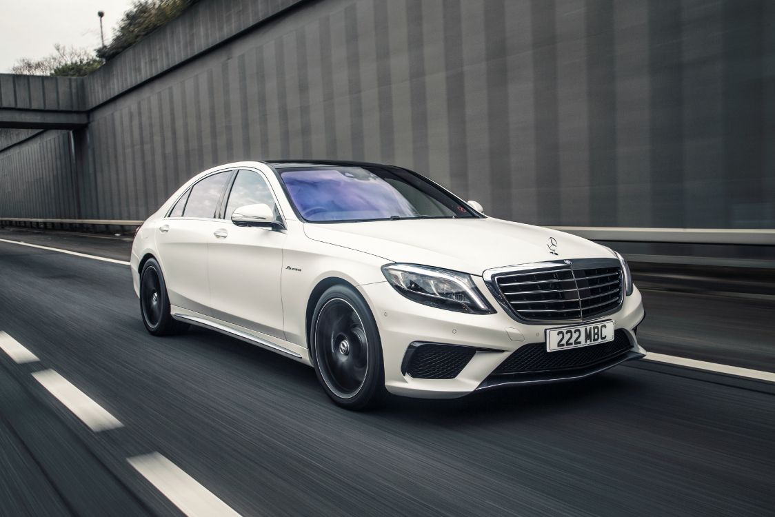 silver mercedes benz coupe on road